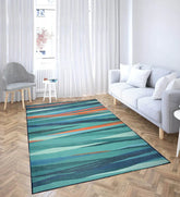 Machine washable area rug with teal, coral, and neutral tones.